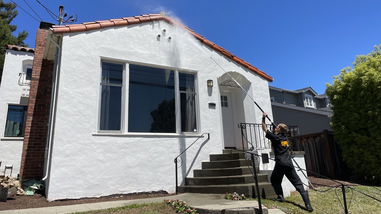 Pressure washing of exterior of residential home.