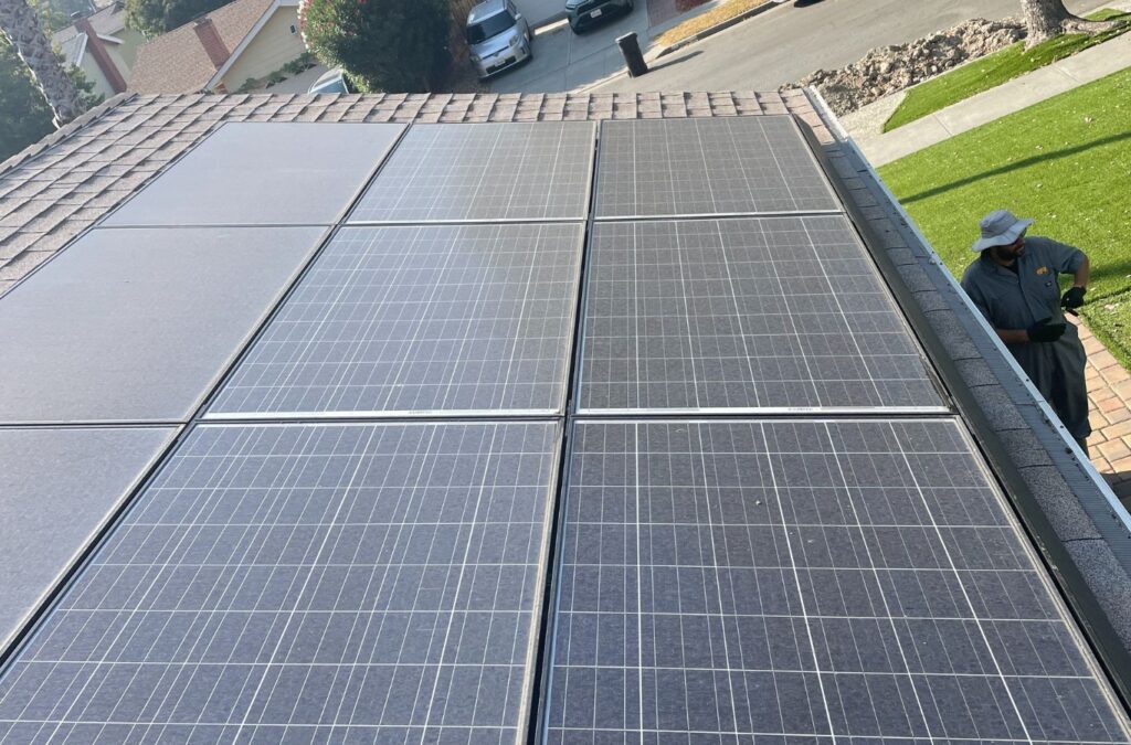 A Slon Exterior Care professional performing expert solar panel washing in Sunnyvale. Solar panel washing near me.