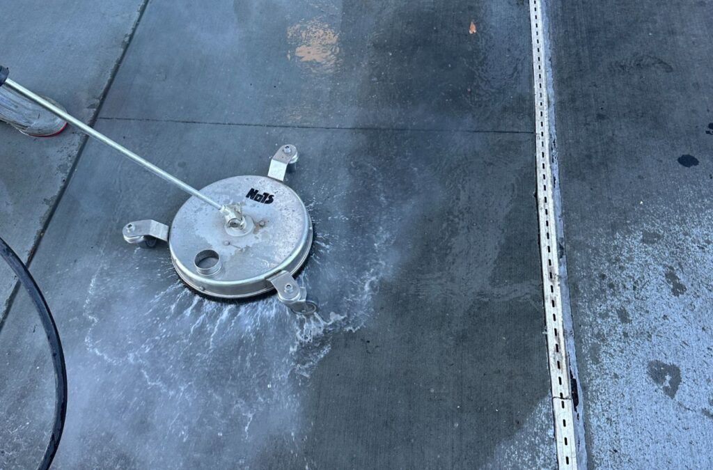 A Slon Exterior Care team member delivering power washing in Palo Alto, CA, demonstrating surface restoration on patios and pathways.