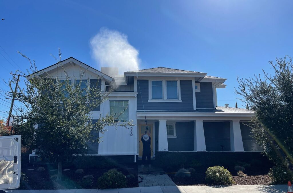 Slon Exterior Care staff providing power washing in Santa Clara, CA, restoring a backyard patio while ensuring cleanliness and surface protection.