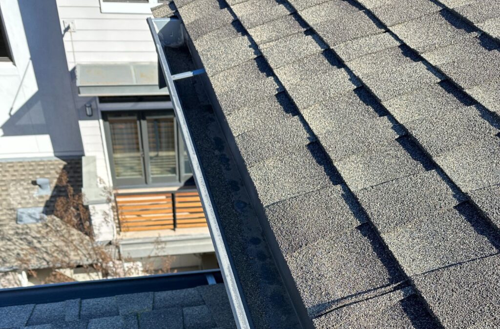 A Slon Exterior Care expert demonstrating the superior quality of gutter cleaning services in Campbell, CA, highlighting the company's commitment to excellence. Gutter Cleaning near me.
