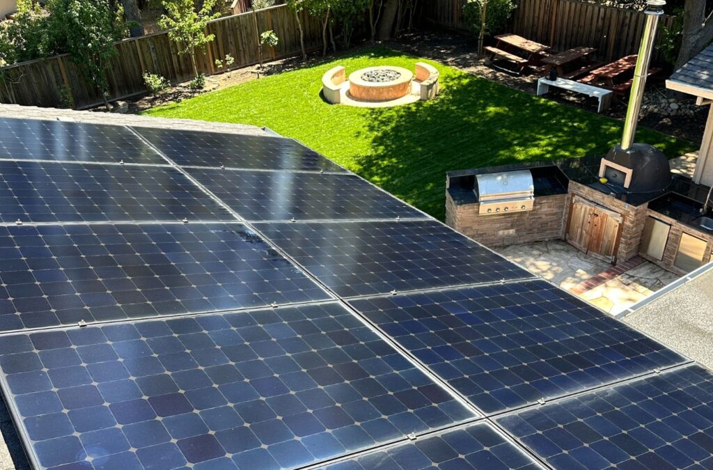 Slon Exterior Care technician performing Solar Panel Cleaning in Redwood City, CA, removing grime and improving performance.