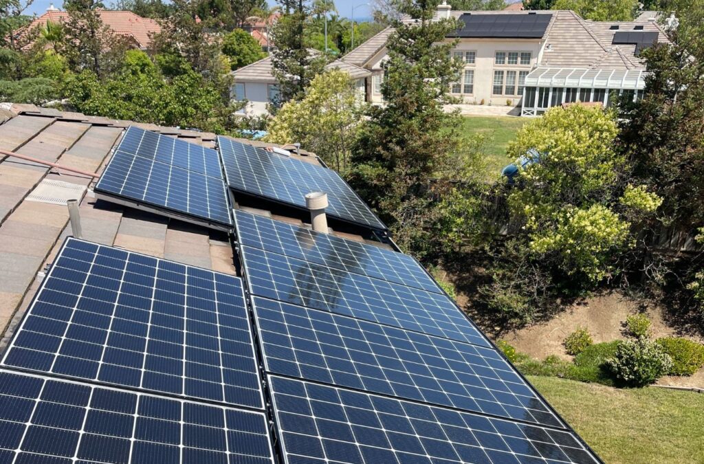 Slon Exterior Care tech doing Solar Panel Cleaning in Campbell, CA with soft brushes for safe, efficient performance.