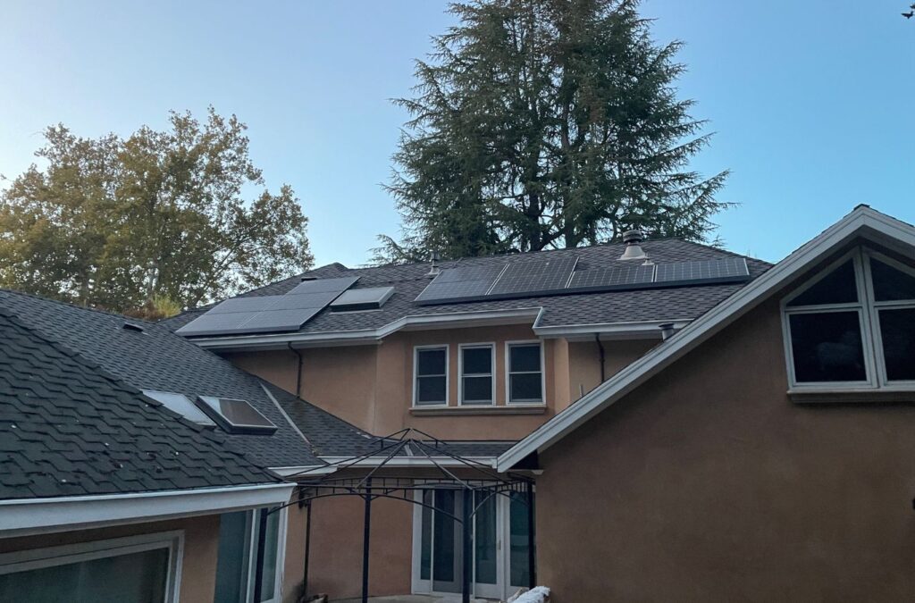 Slon Exterior Care technician cleaning roof in Saratoga, CA using soft-wash methods for safe and lasting shine.